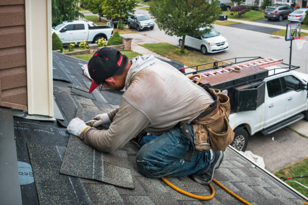 Professional Roof Replacement technician working in Russell, MA